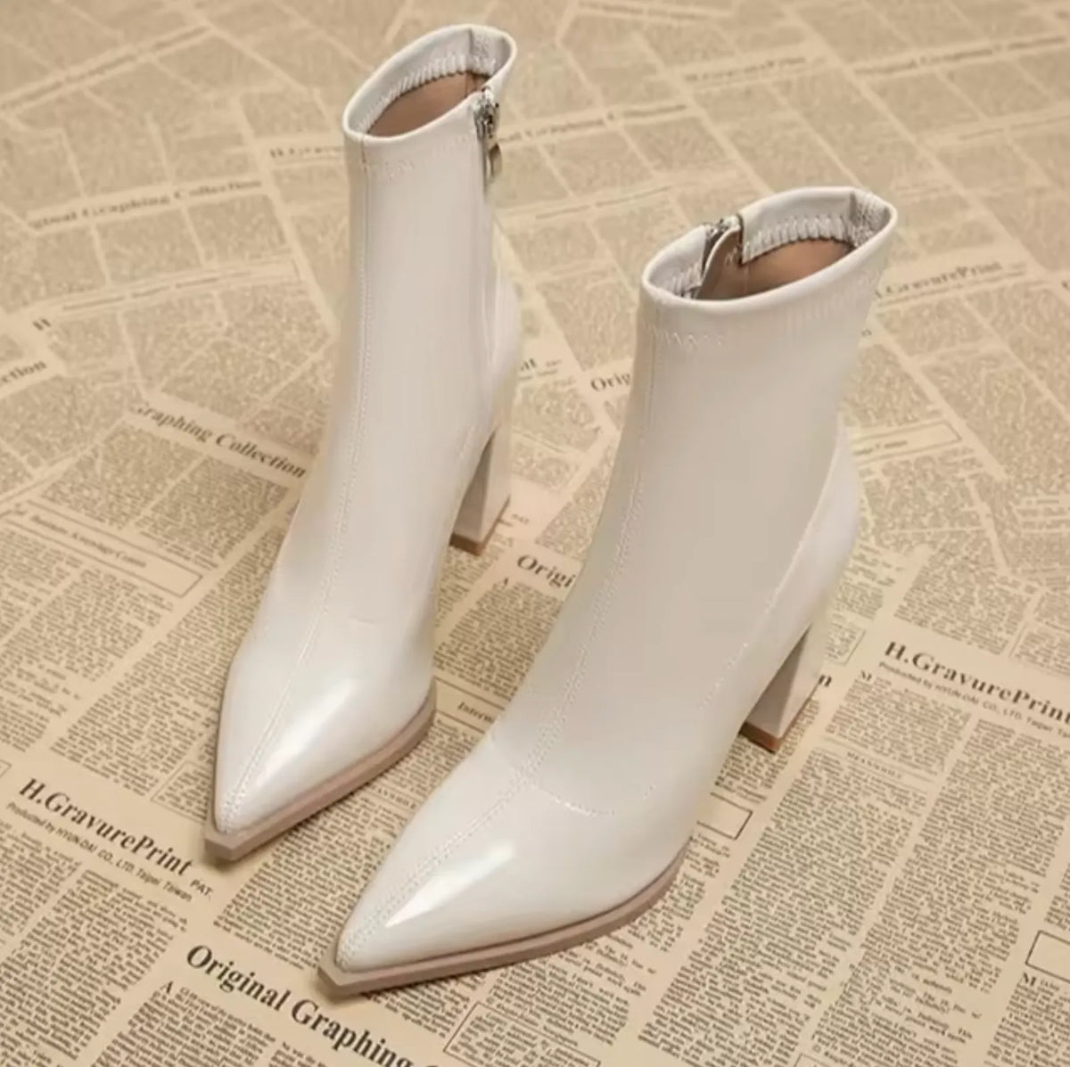 Homixa Anais women's casual winter ankle boots with pointed toes and low heels, showcasing stylish black leather footwear.