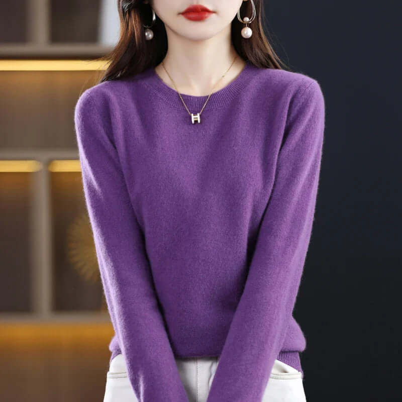 Homixa Belvia women's fine-knit crew-neck sweater with ribbed cuffs and solid color finish, displayed on a neutral background.