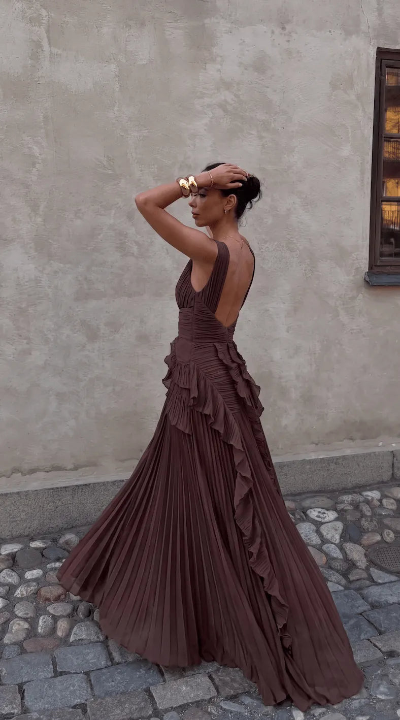 Homixa women's pleated halter-neck ruffle maxi dress displayed on a model, showcasing the elegant flowing design and feminine style.