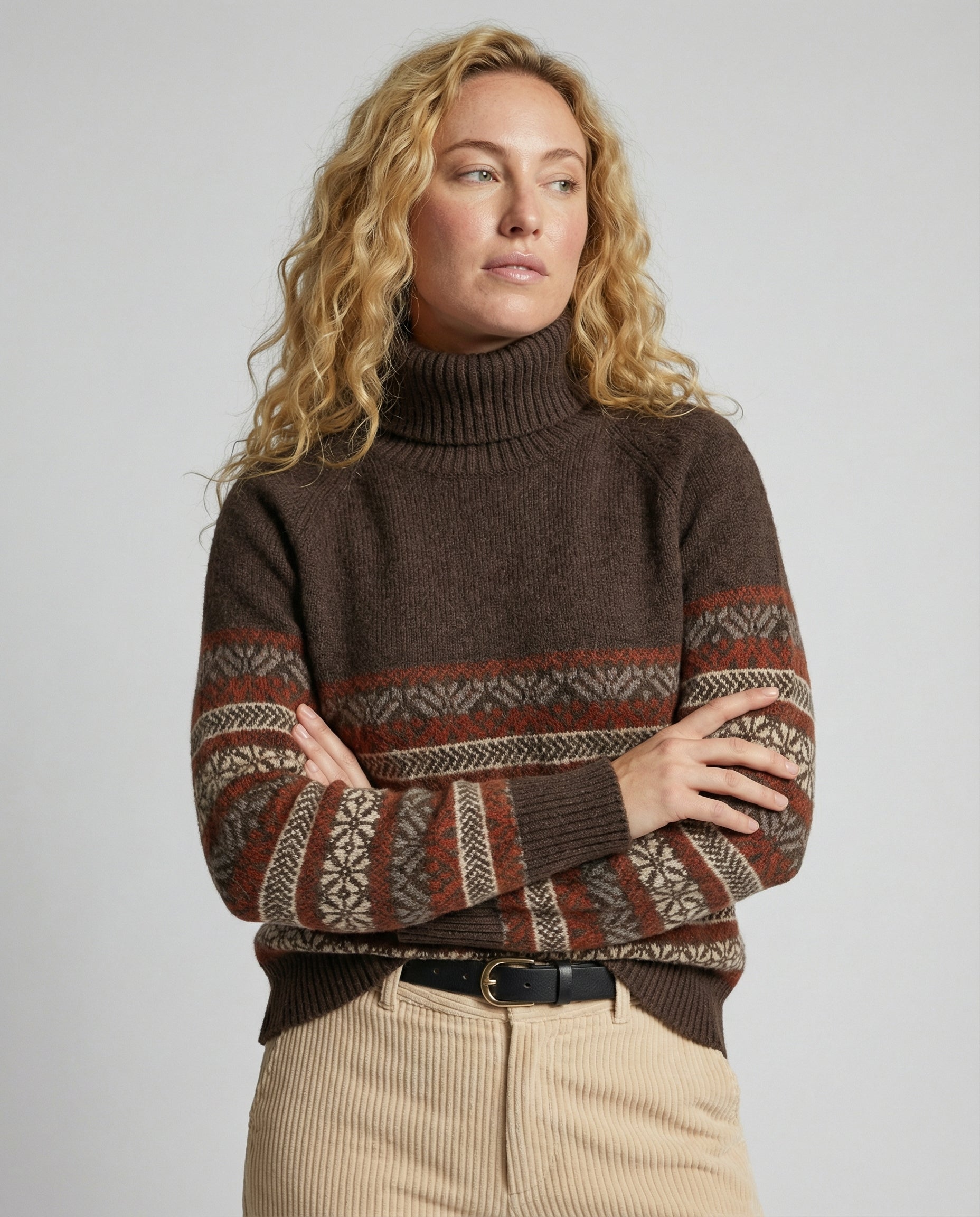Close-up of a women's Homixa sweater from the Everyday Layer Lily Edit, showing soft knit fabric and detailed stitching.