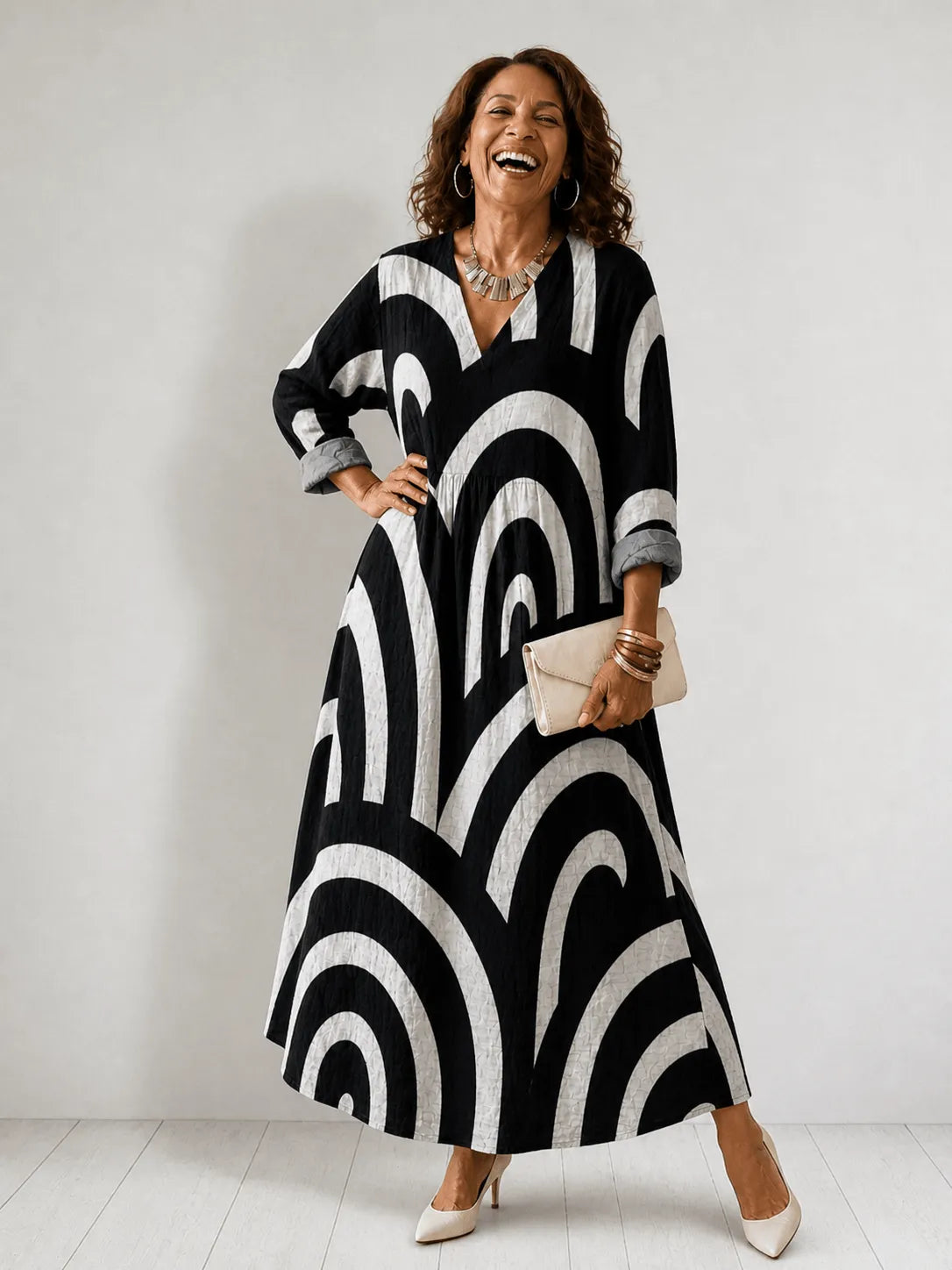 Homixa women's geometric-print V-neck maxi dress with flowing fabric and bold pattern, perfect for stylish summer wear.