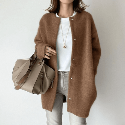 Women's elegant knit cardigan from Lunirel, featuring a stylish design, soft texture, and long sleeves, perfect for layering.