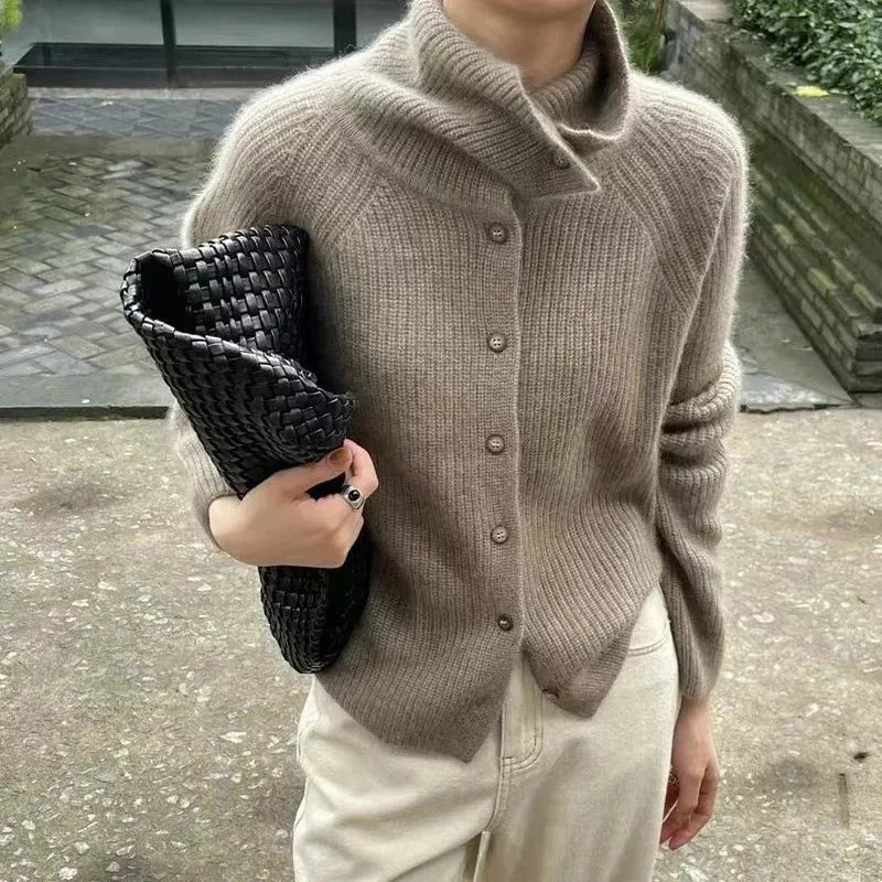 Homixa Alondra women's relaxed soft-knit turtleneck sweater with button details, shown in a cozy, comfortable fit.