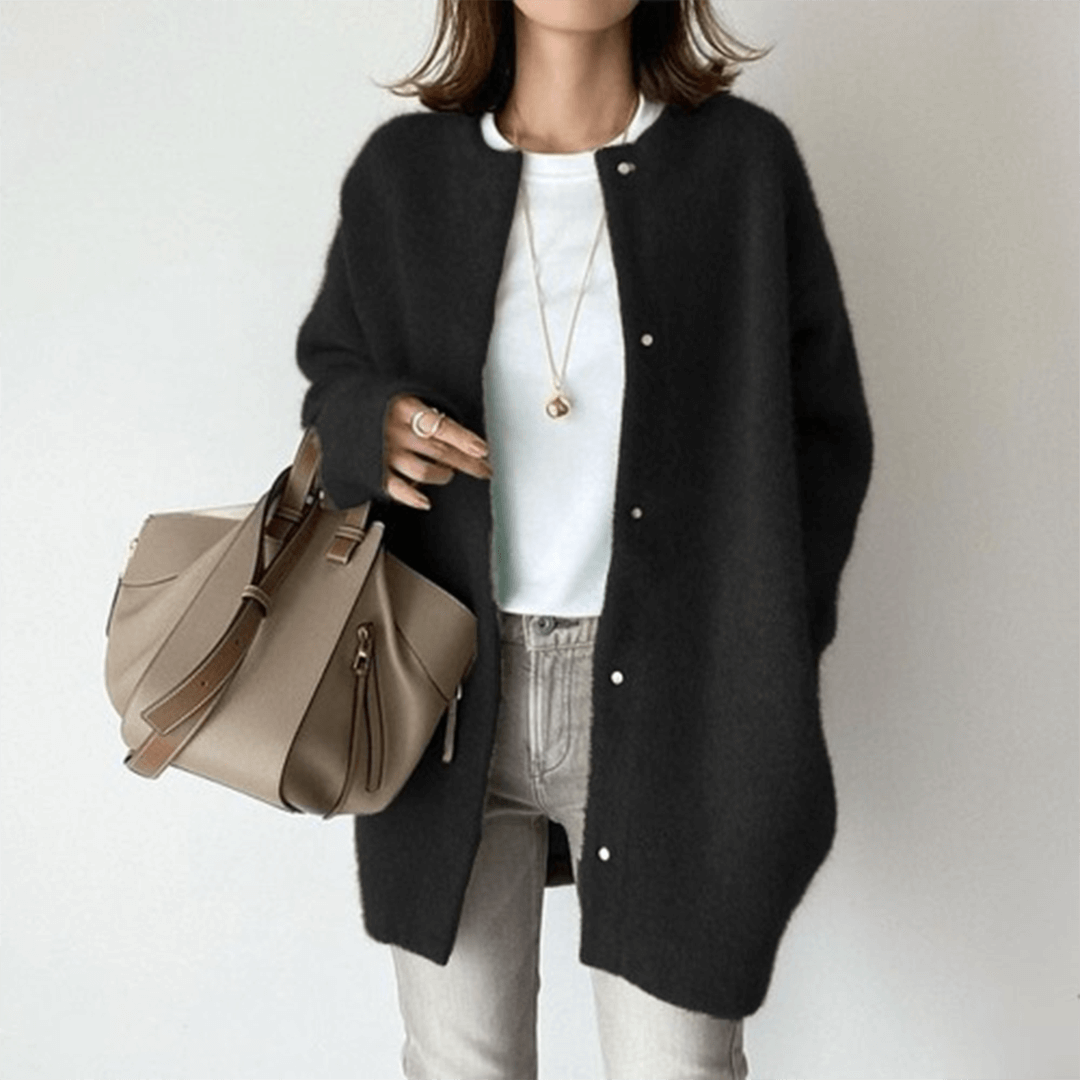 Women's elegant knit cardigan by Lunirel, featuring a cozy hood and soft sweater material in a stylish design.