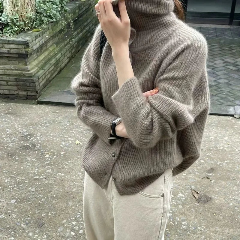 Homixa women's turtleneck sweater featuring a relaxed fit, soft knit fabric, and classic turtleneck design.