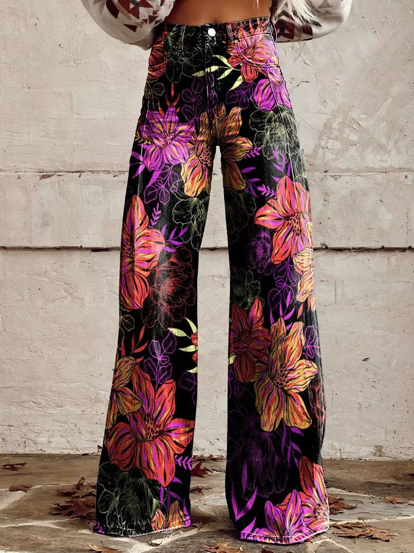 Homixa Delrielle high-waisted floral bell-bottom trousers with belt loops and stretch fabric, shown on a model.