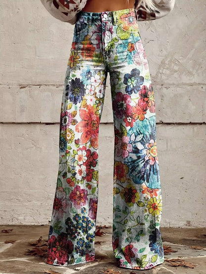 Homixa Delrielle high-waisted floral bell-bottom trousers with belt loops and stretch fabric, styled with a vibrant floral pattern.