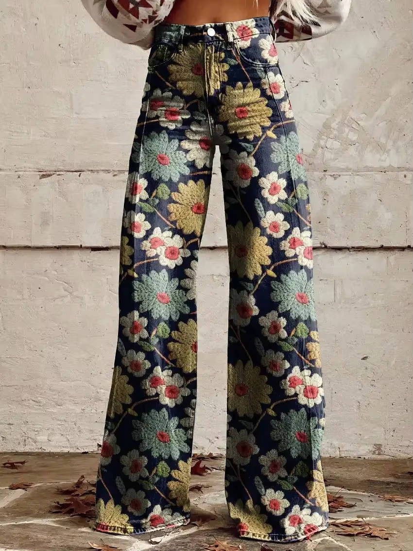 Homixa Delrielle high-waisted floral bell-bottom trousers with belt loops and stretch fabric, shown from the front.