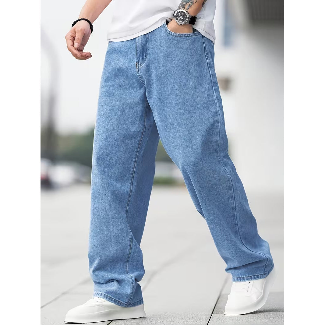 Men's baggy denim jeans by Kate and Wendy with zip fly and five-pocket design, shown on a model.