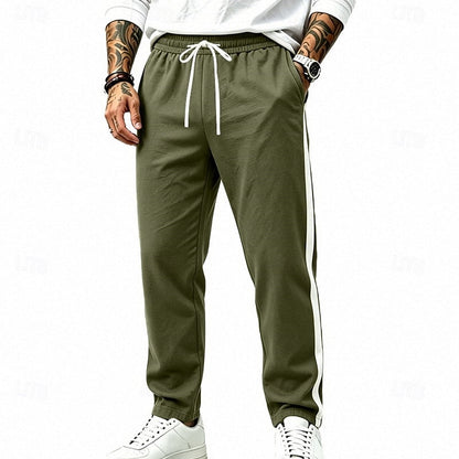 Harper & Wells Damian relaxed side-stripe sweatpants featuring comfortable fit and stylish design, shown in the product image.