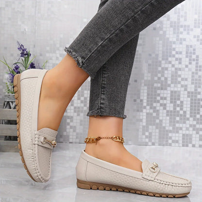 Homixa solid-color moccasins with heart ornament, stylish loafers featuring a sleek design and decorative heart detail.