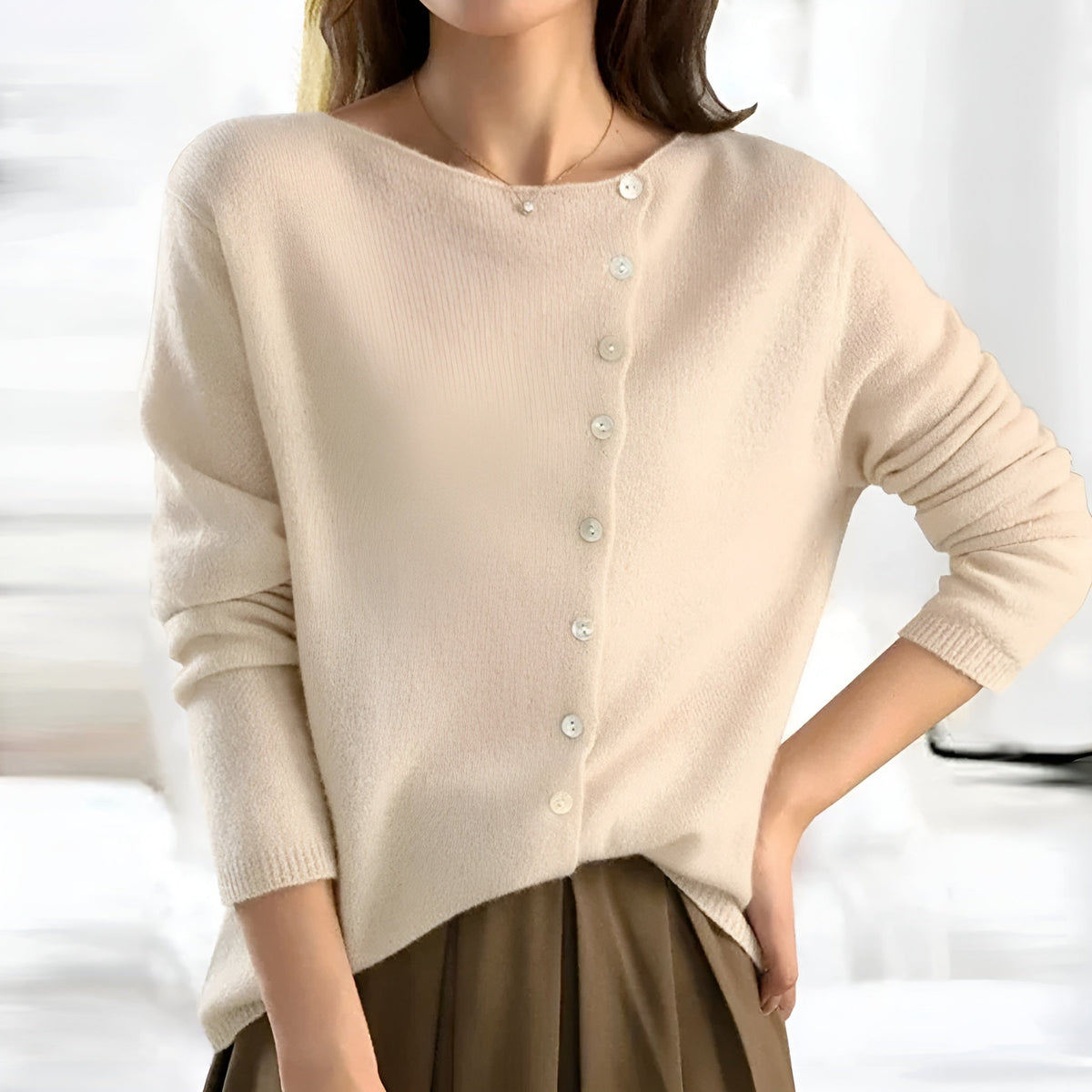 Sarah & Kate Charleston Cashmere Luxury Cardigan in soft beige, featuring a cozy, elegant design with front buttons and long sleeves.