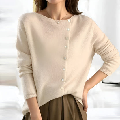 Sarah & Kate Charleston Cashmere Luxury Cardigan in soft beige, featuring a cozy, elegant design with front buttons and long sleeves.