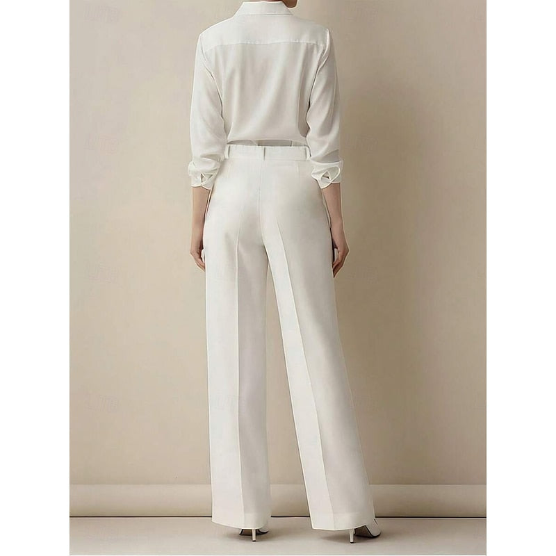 Harper & Wells Odette high-waist tailored trousers, stylish pants with a sleek fit and classic design, shown on a model.