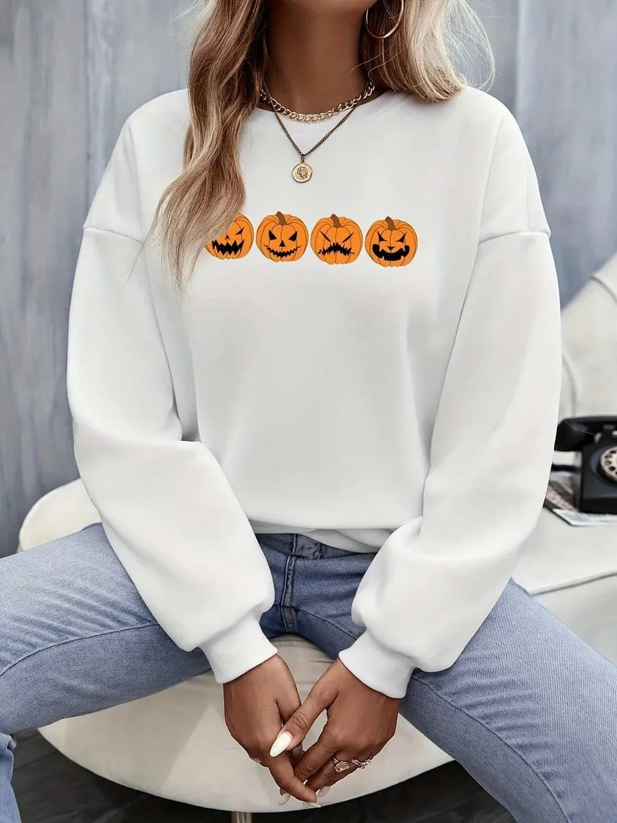 Women's Halloween sweatshirt by Homixa featuring a festive Jack-o-Lantern graphic on a cozy crewneck sweatshirt.