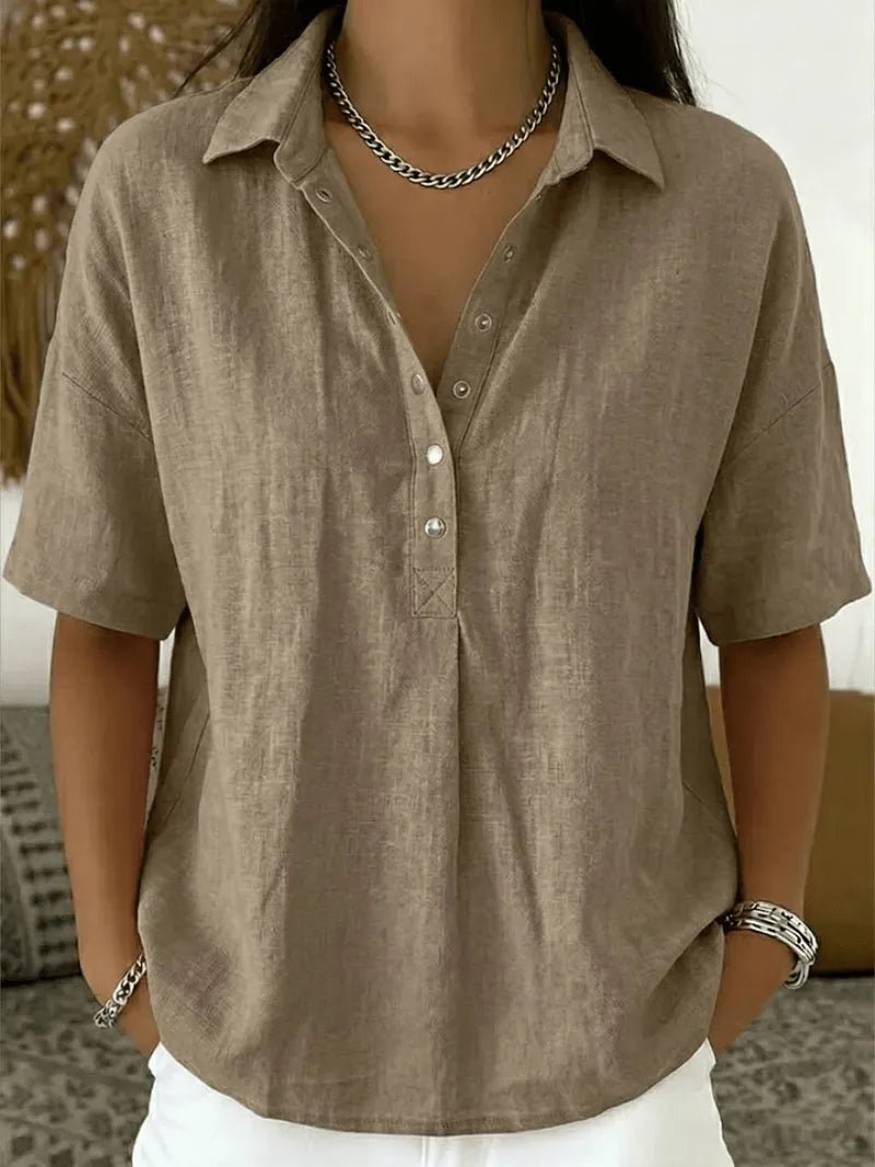 Homixa Avery women's relaxed collared shirt displayed on a hanger, showcasing soft fabric and casual style.