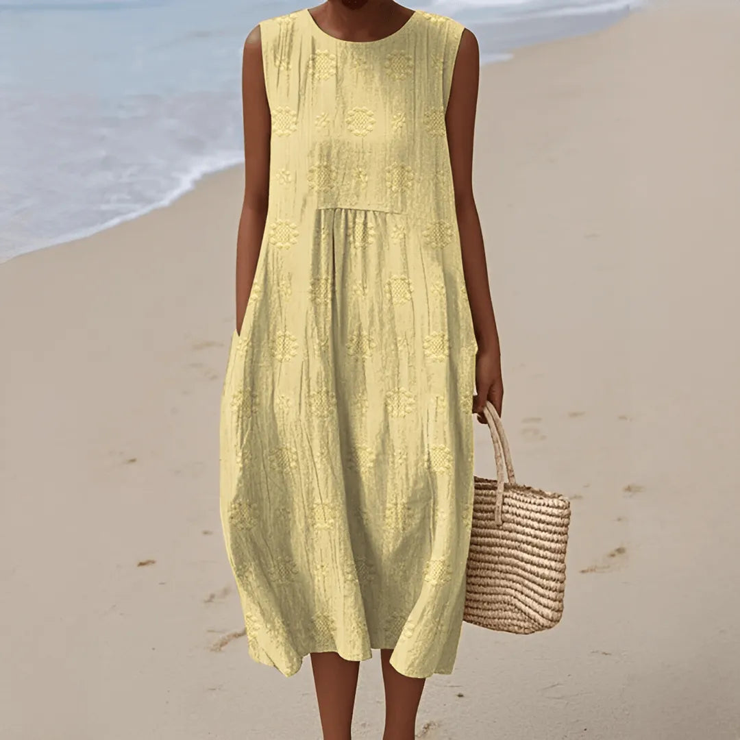 Homixa women's sleeveless pocket dress, lightweight fabric, casual style, knee-length with side pockets, suitable for warm weather.