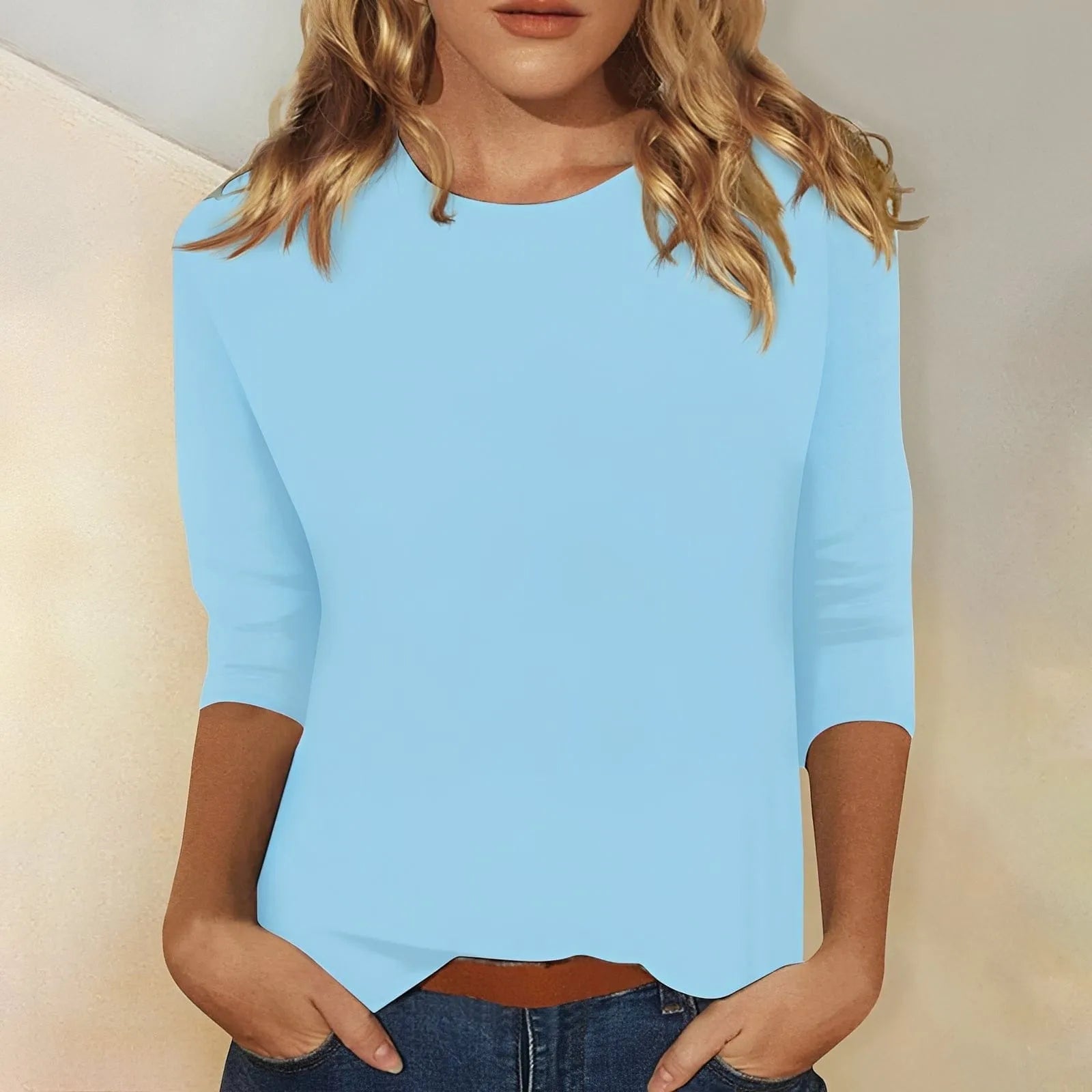 Homixa women's three-quarter-sleeve crew-neck top, soft fabric, in a casual fit, shown on a model.
