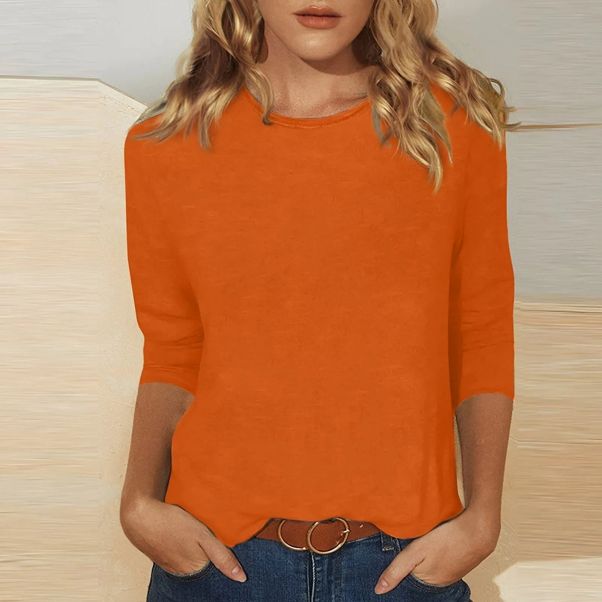 Homixa women's three-quarter-sleeve crew neck top, casual shirt in soft fabric, shown in a neutral color on a plain background.