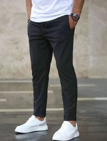 Homixa men's jogger pants with a corduroy look and relaxed fit, featuring soft fabric and stylish casual design.