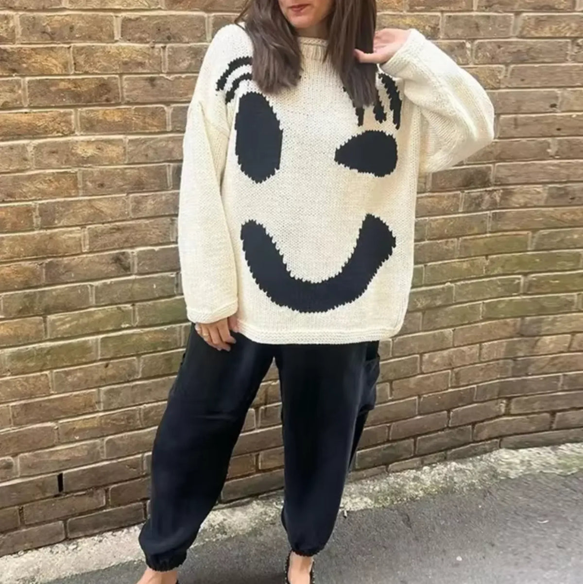 Homixa women's knit sweater with an oversized and relaxed fit, featuring soft, cozy knit fabric and a stylish, casual design.