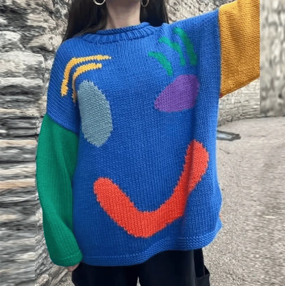 Homixa women's oversized knit sweater with relaxed fit, soft knit fabric, and cozy design for casual wear.
