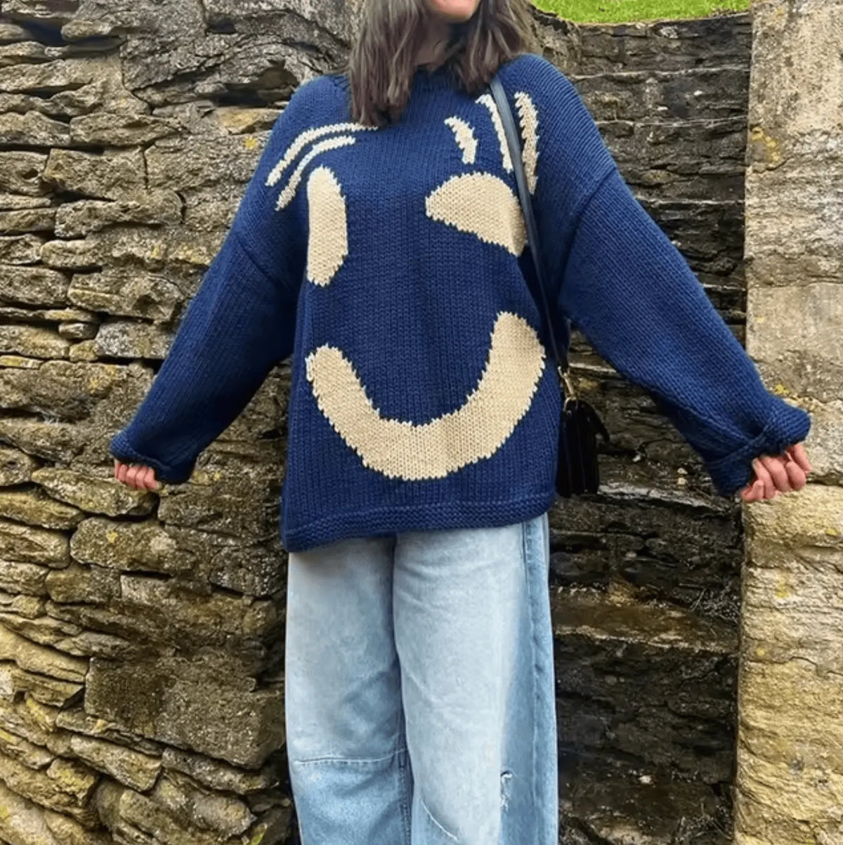Homixa women's knit sweater with oversized and relaxed fit, featuring soft, cozy knit fabric and a stylish, casual design.