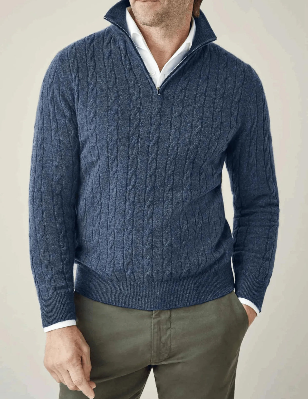 Homixa men's cable-knit quarter-zip sweater showing a close-up of the textured knit fabric and zipper detail.