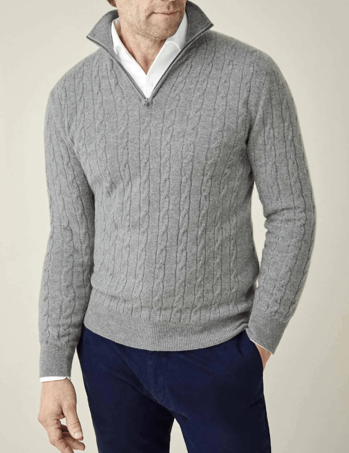 Homixa men's cable-knit quarter-zip sweater in gray, featuring a close-up of the textured knit pattern and zipper detail.