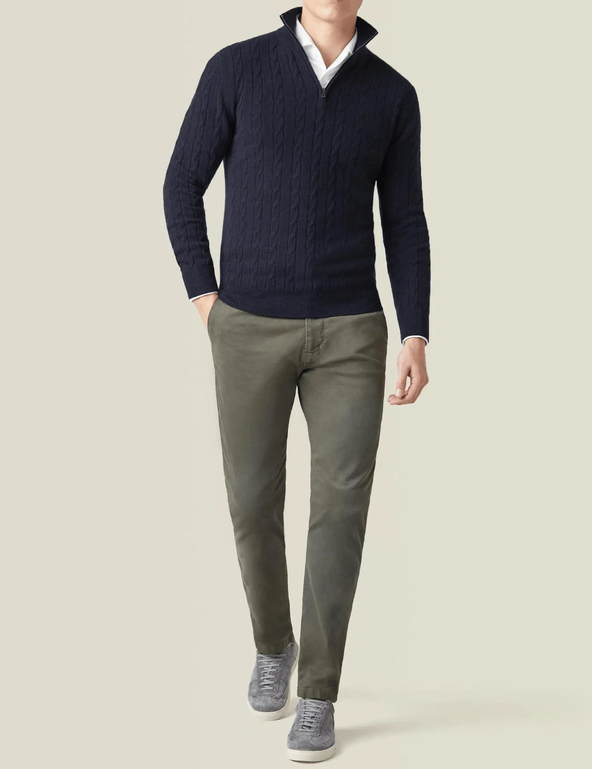 Homixa men's cable-knit quarter-zip sweater showing a close-up of the textured knit pattern and zipper detail.