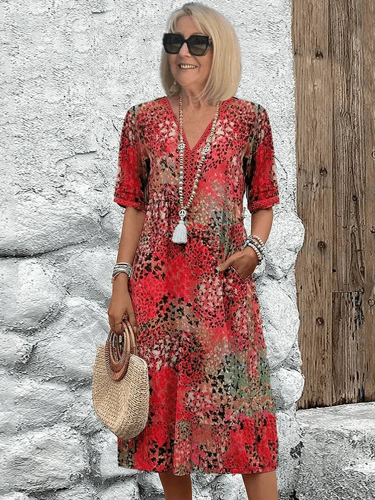 Homixa Sienna women's printed midi dress featuring a stylish pattern and flowing fabric, perfect for casual or semi-formal occasions.