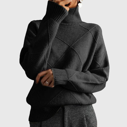 Homixa women's turtleneck sweater with a bold geometric pattern, cozy knit design, ideal for stylish winter wear.