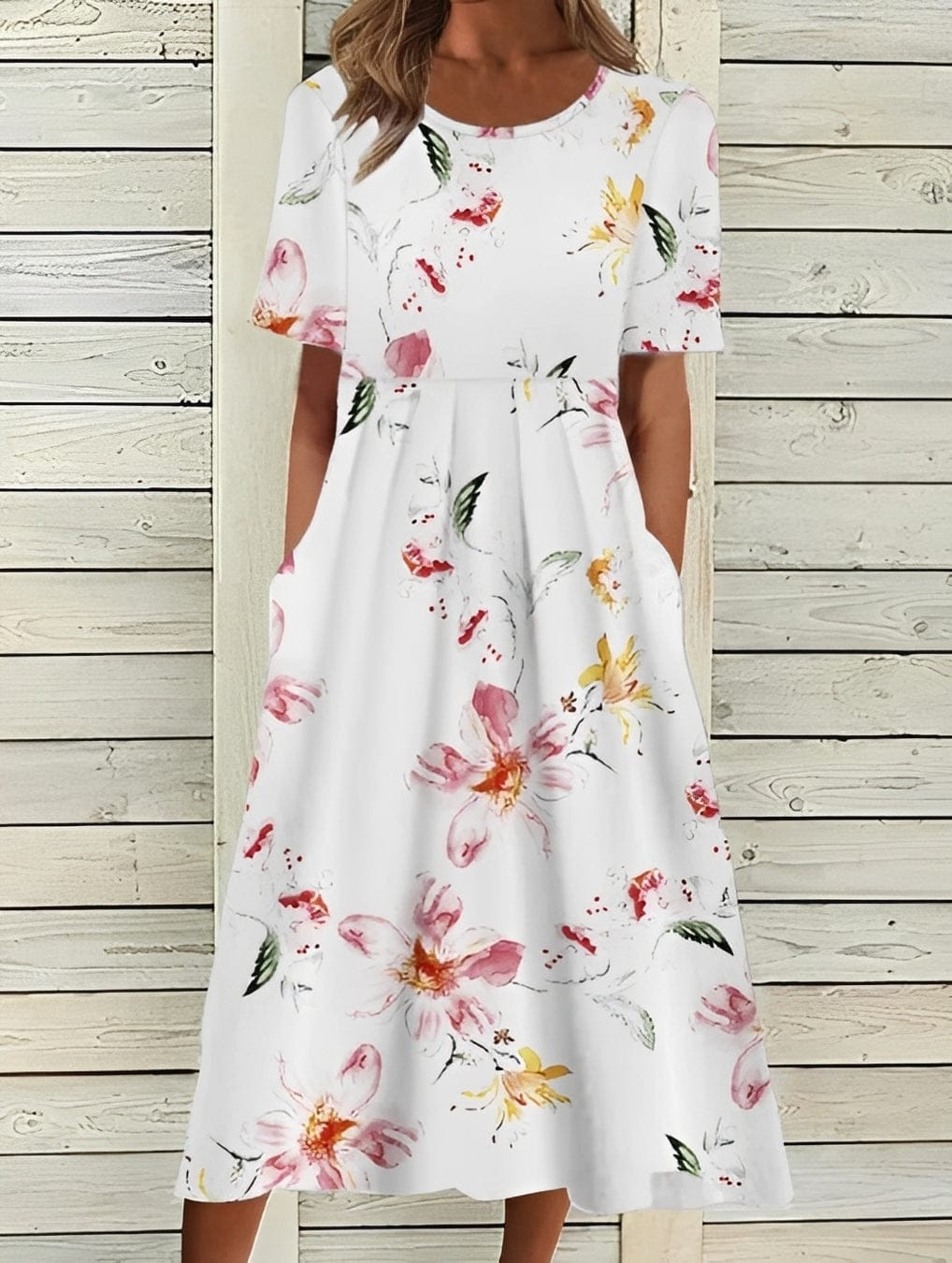 Elegant women's midi dress by Mainz-Mode featuring a floral pattern and flowing silhouette, perfect for stylish occasions.