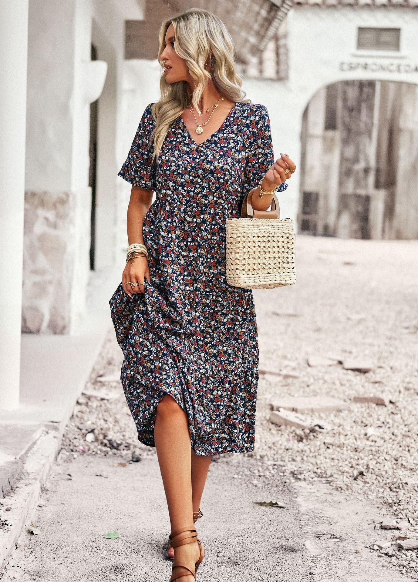 Women’s midi dress by Mainz-Mode with a floral print and comfortable fit, featuring a mid-length design and stylish silhouette.