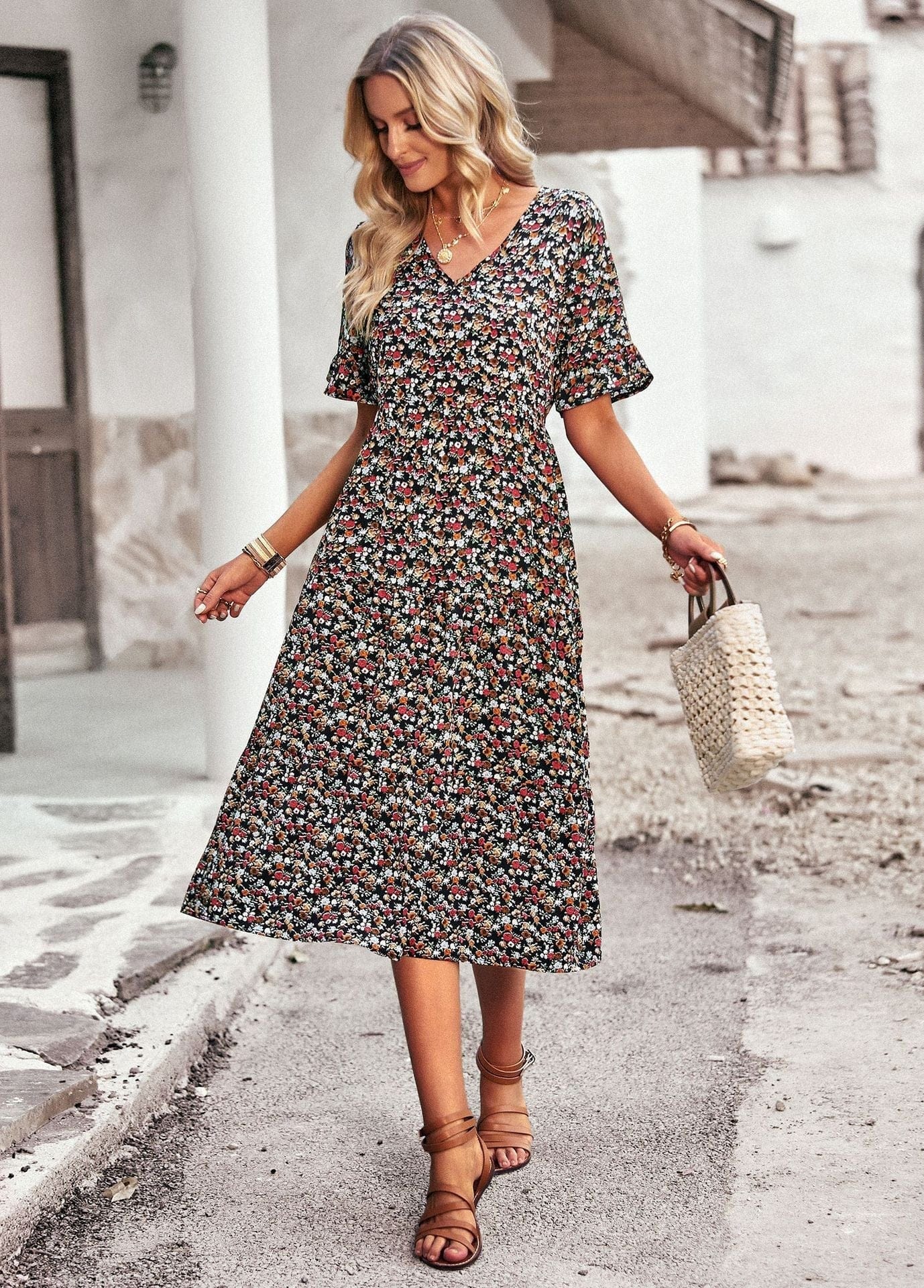 Womens floral midi dress by Mainz-Mode with a comfortable fit, featuring a flowy fabric and vibrant floral pattern.