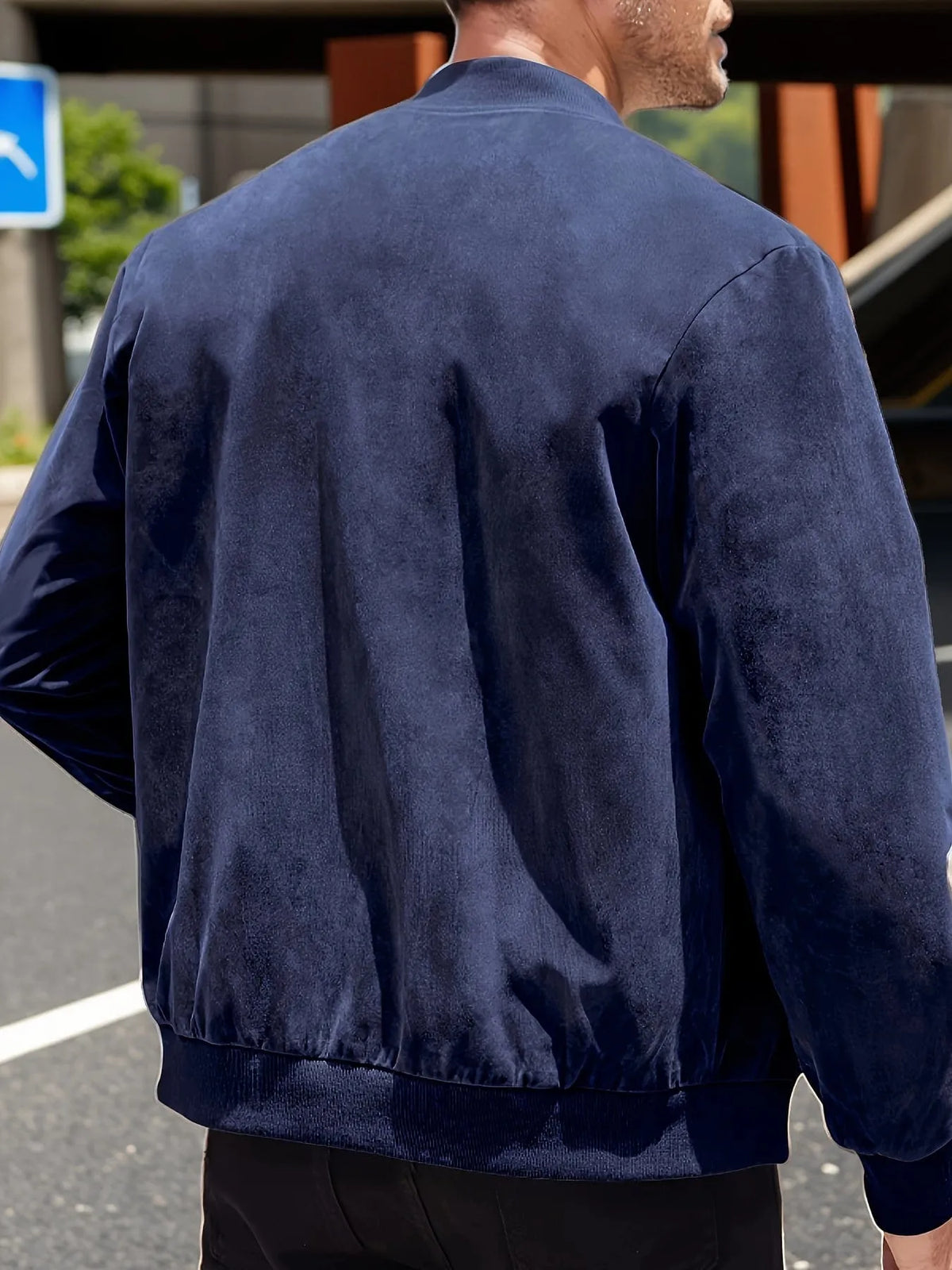 Homixa men's zip-up jacket with tailored fit and zip-front design, shown in a casual outdoor setting.