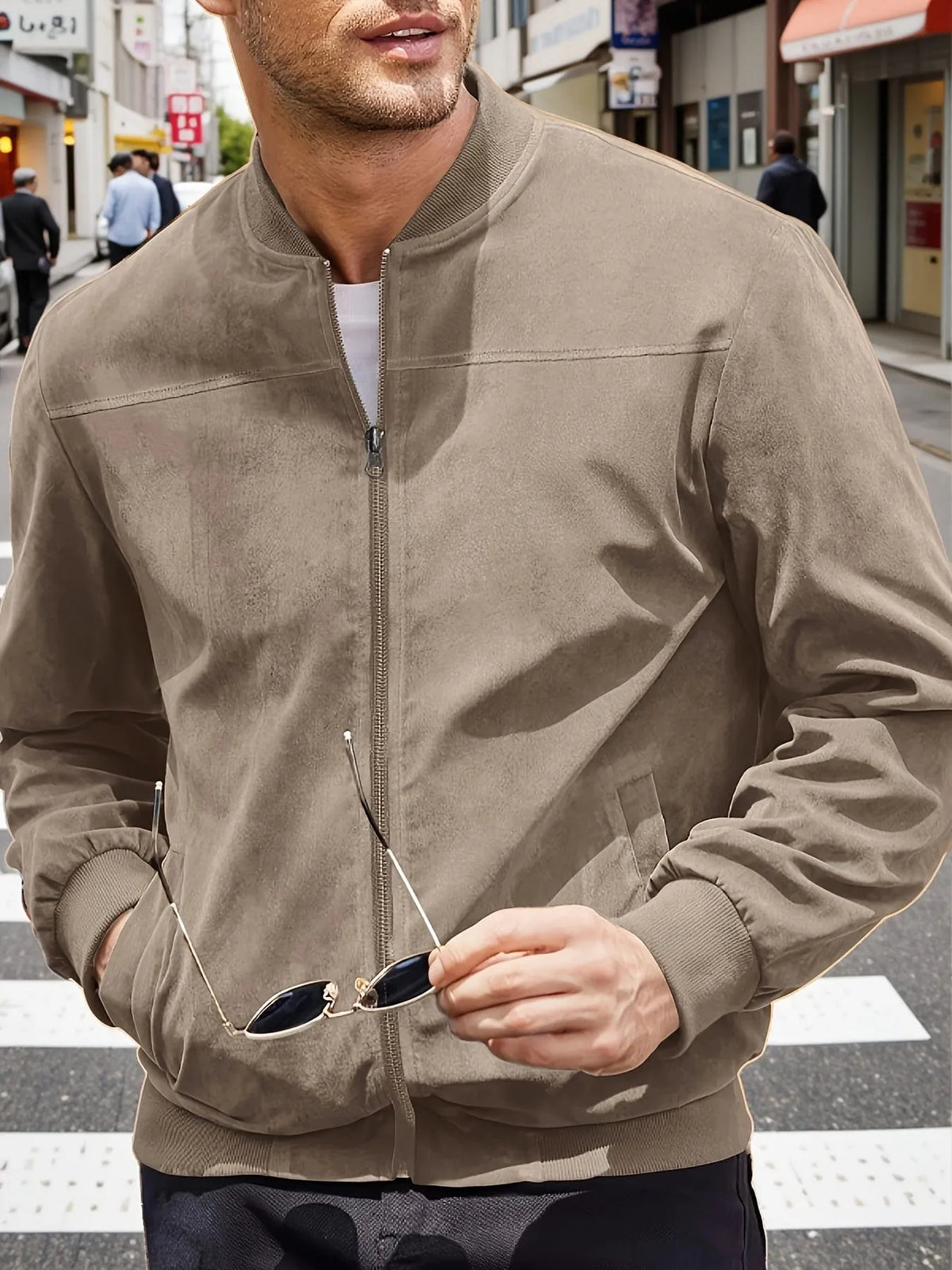 Men's Homixa zip-up jacket with tailored fit and zip-front closure, shown in a stylish in-motion shot.