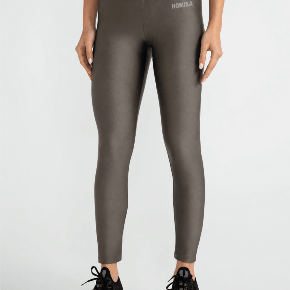 Homixa women's metallic gray shimmer leggings with a fitted, stretchy design and shiny metallic finish.