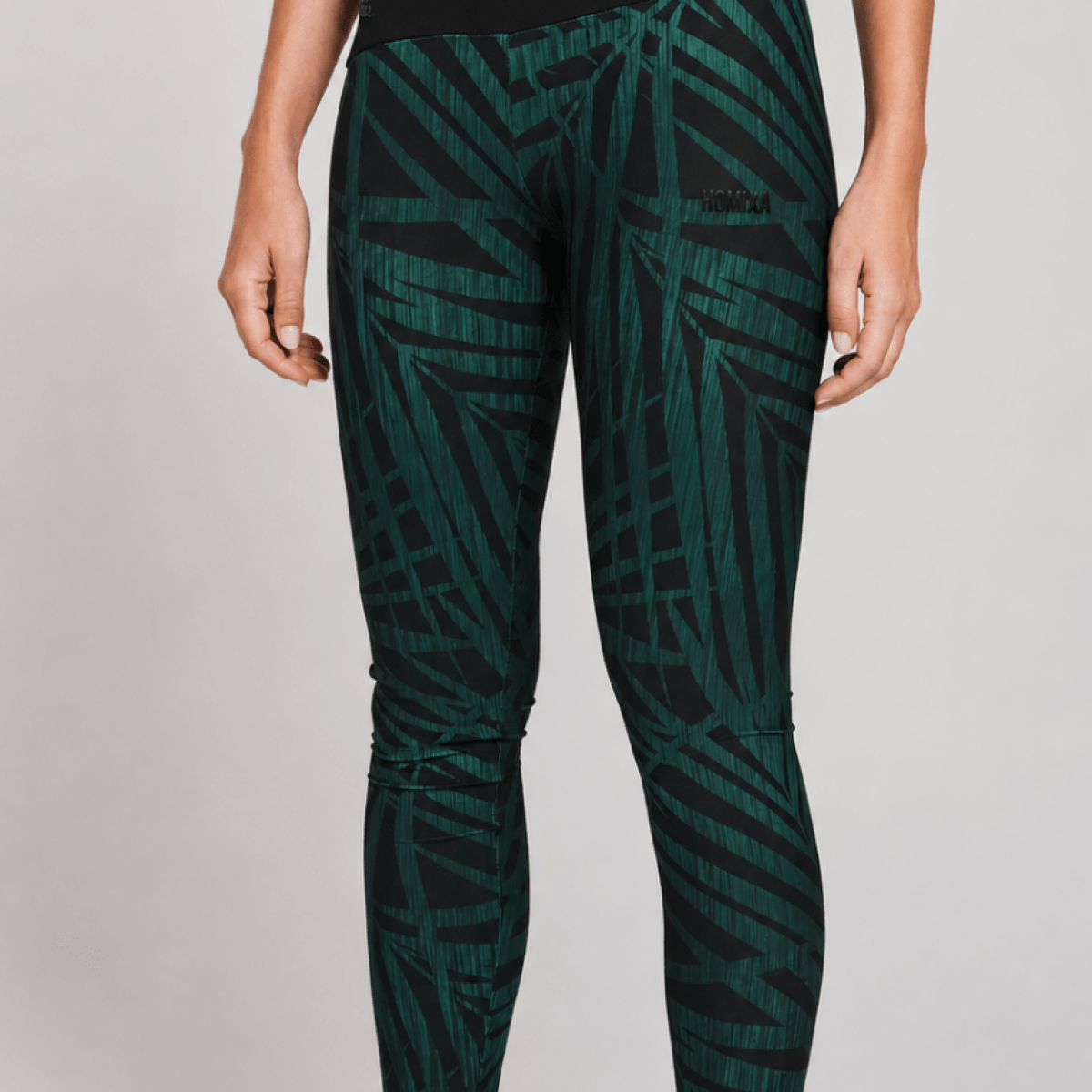 Homixa Tropic Geometric women's leggings in green and black with vibrant tropical patterns and comfortable fit.