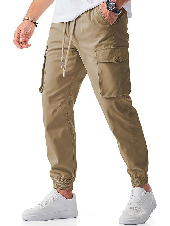 Homixa men's cargo joggers featuring a drawstring waist, flap pockets, and tapered cuffs, shown in a casual fit.