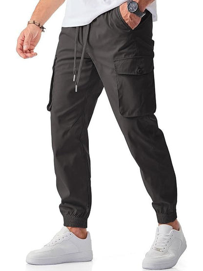 Homixa Belvora men's cargo joggers with drawstring waist, flap pockets, tapered cuffs, featuring durable fabric and casual style.