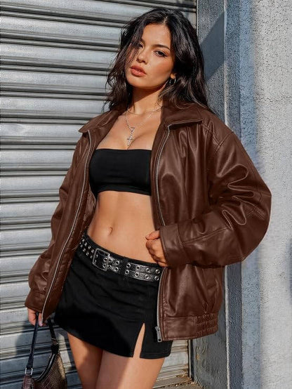 Women's oversized faux leather jacket by Olive & Evy featuring a biker moto style, medium weight fall winter outerwear.