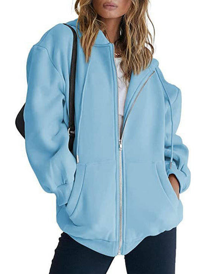 Olive & Evy women's oversized zip-up hoodie with fleece material, front pockets, and a relaxed fit, perfect for casual wear.