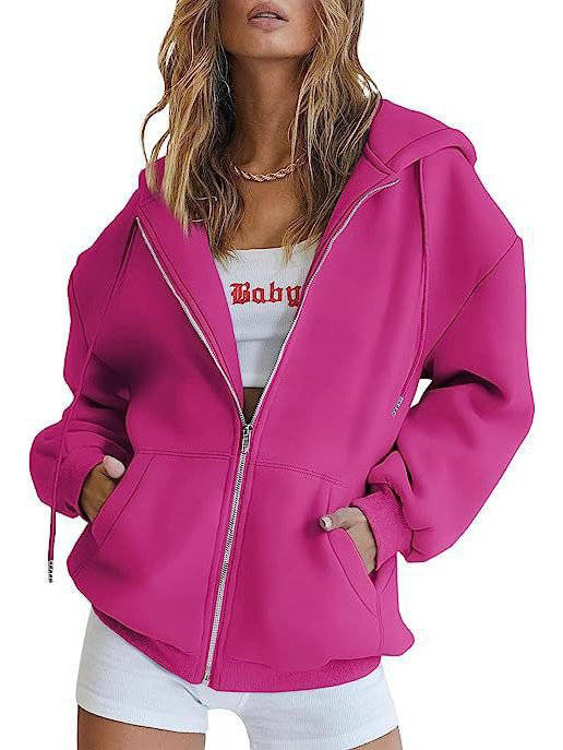 Olive & Evy women's oversized zip-up hoodie with fleece material, front pockets, and a relaxed fit, ideal for casual wear.