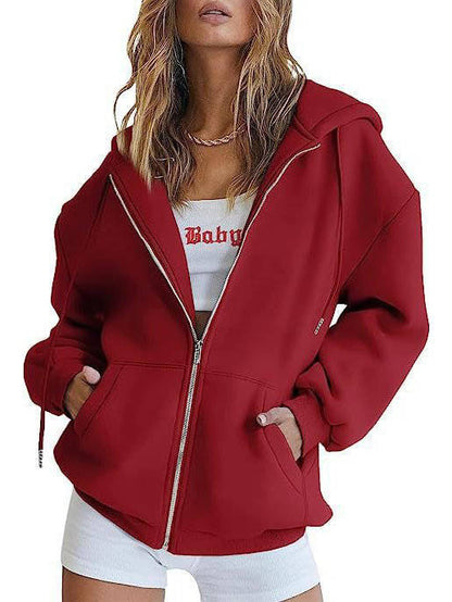 Olive & Evy women's oversized zip-up hoodie in fleece, with front pockets and a relaxed fit, perfect for casual wear.