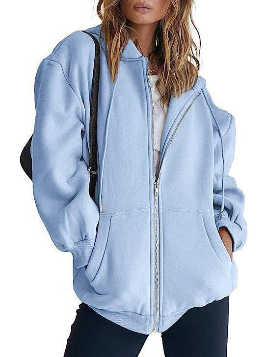 Olive & Evy women's oversized zip-up hoodie with fleece material, front pockets, and a relaxed fit, perfect for casual wear.