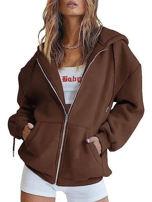 Olive & Evy women's oversized zip-up hoodie with fleece fabric, front pockets, and a relaxed fit, perfect for casual wear.