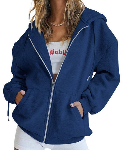 Olive & Evy women's oversized zip-up hoodie with fleece material, front pockets, and a casual relaxed fit.