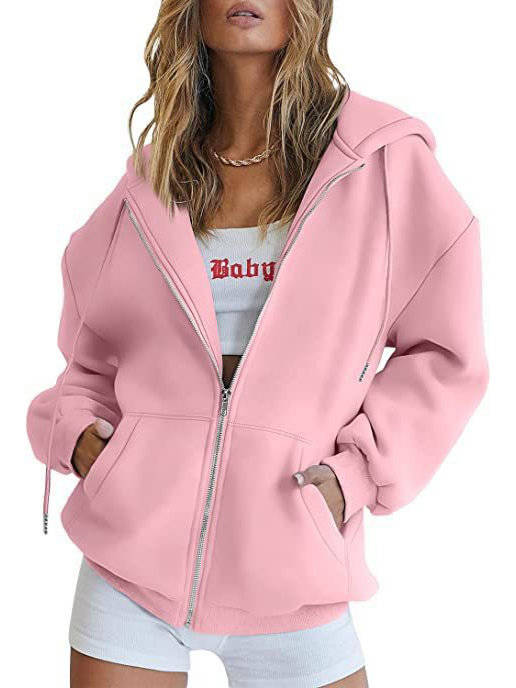 Olive & Evy women's oversized zip-up hoodie with fleece fabric, front pockets, and a relaxed fit, shown in a cozy fleece sweatshirt style.