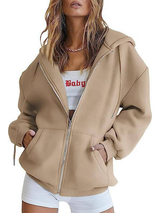 Olive & Evy women's oversized zip-up hoodie with fleece material, front pockets, and a relaxed fit, ideal for casual wear.